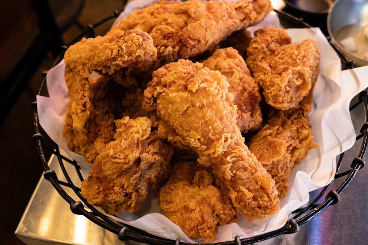 Basket of golden fried chicken pieces
